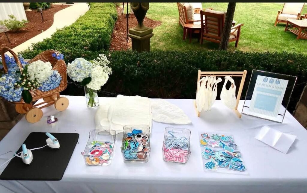 Candy favor bar with glass jars and bags on a white table outdoors