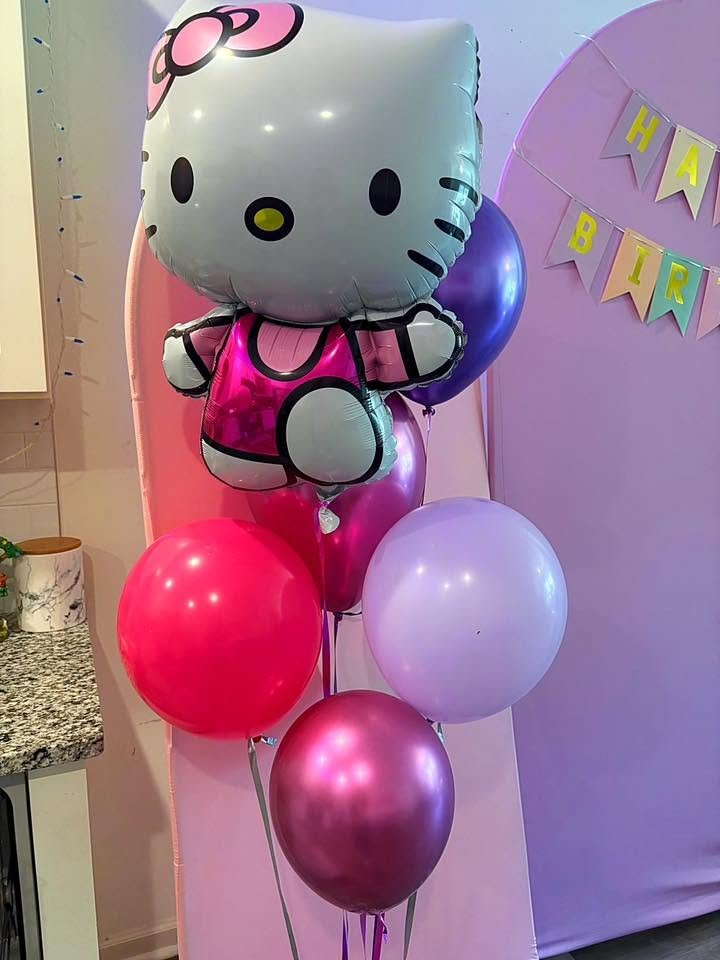 Hello Kitty foil balloon bouquet with hot pink, lilac and chrome purple balloons