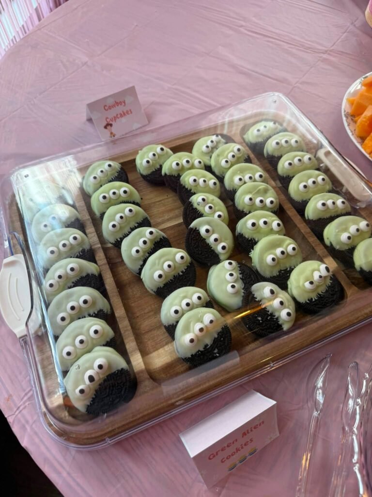 Toy Story alien Oreo treats dipped in green candy melts with candy eyes