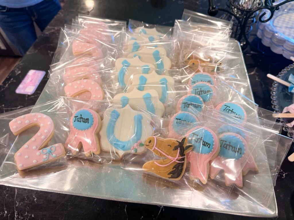 Bagged number 2 sugar cookies in pink and blue for an Off Two the Races party