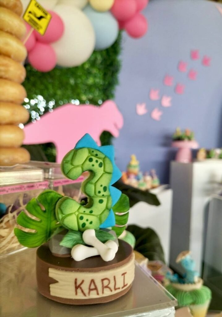 Green leafy number 3 cake topper with a bone on a name base