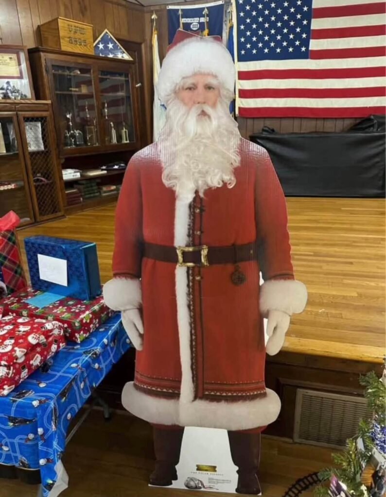 Life size Santa Claus cutout at a Polar Express birthday party