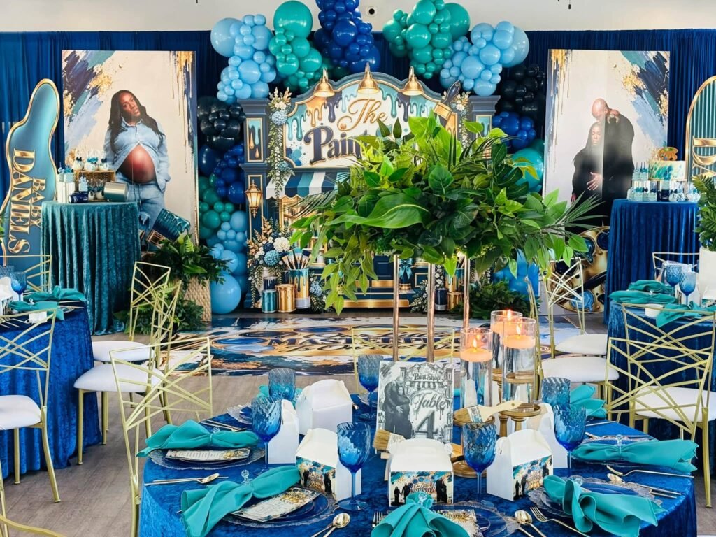 Wide view of a navy and teal Paint Shop baby shower room
