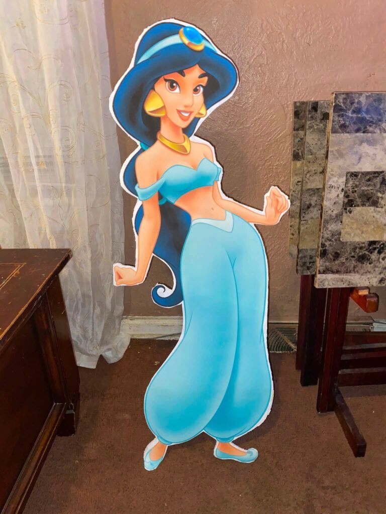 Life size Jasmine cutout standee in a living room