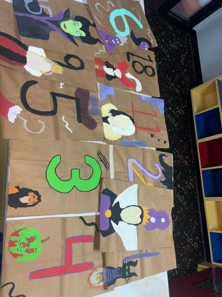 Paper hopscotch with numbers and villain pictures