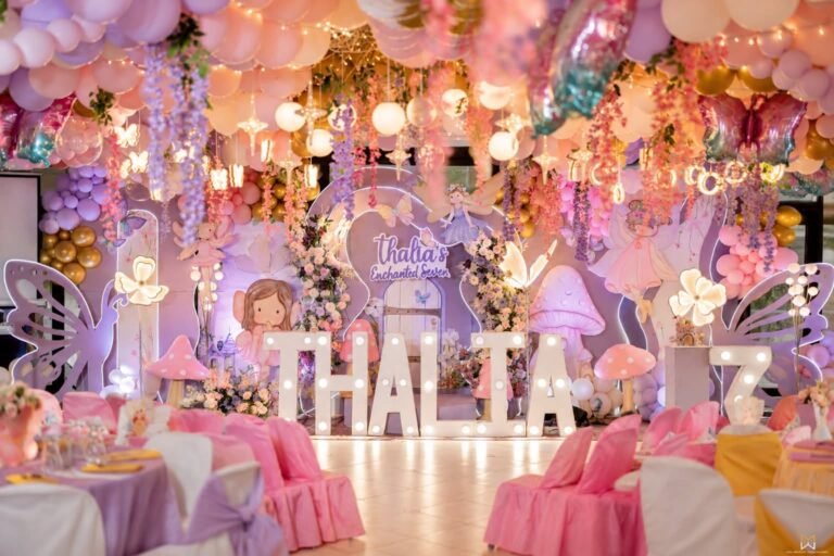 Fairy 7th birthday hall with light up name letters and a balloon ceiling
