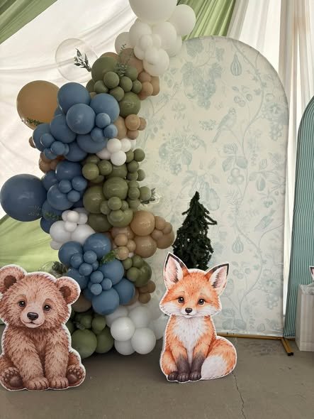 Woodland baby shower balloon garland in blue, sage and brown with bear and fox cutouts
