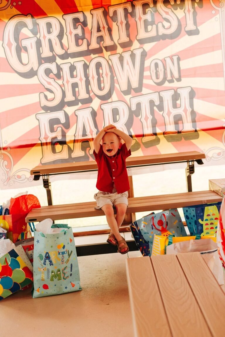 Greatest Show on Earth sign over a wooden bench