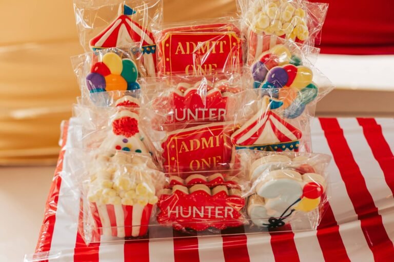 Circus tent and admit one ticket cookies on a striped tray