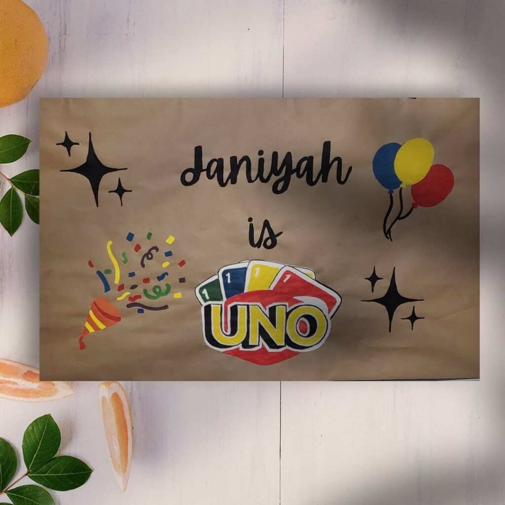 Hand painted UNO birthday banner with balloons and sparkles
