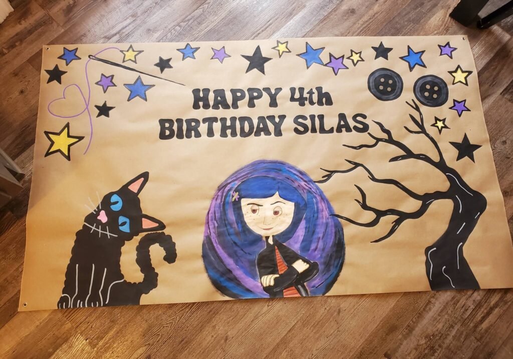 Hand painted Coraline Happy 4th Birthday banner with stars and a cat