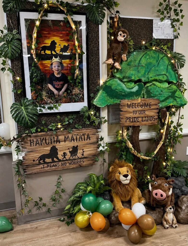 Jungle corner with plush lions, leaves and a framed poster