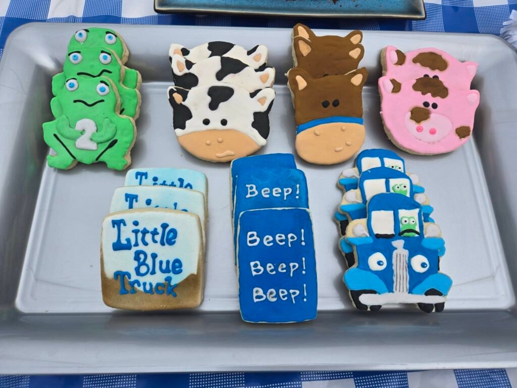 Little Blue Truck cookies with a frog, cow, horse, pig and blue trucks