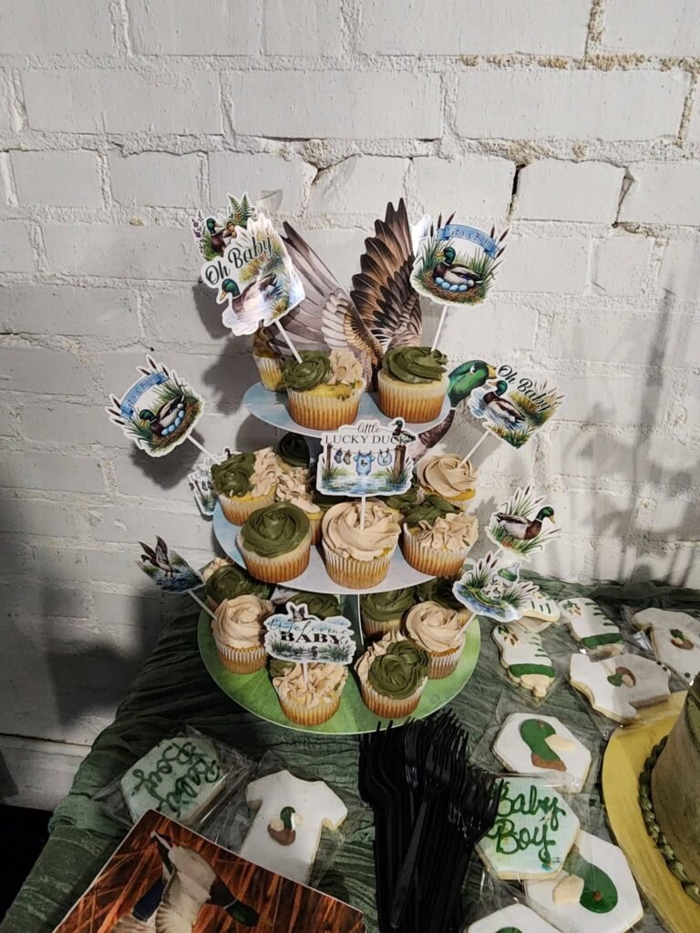 Cupcake tower with duck toppers and leaf decor