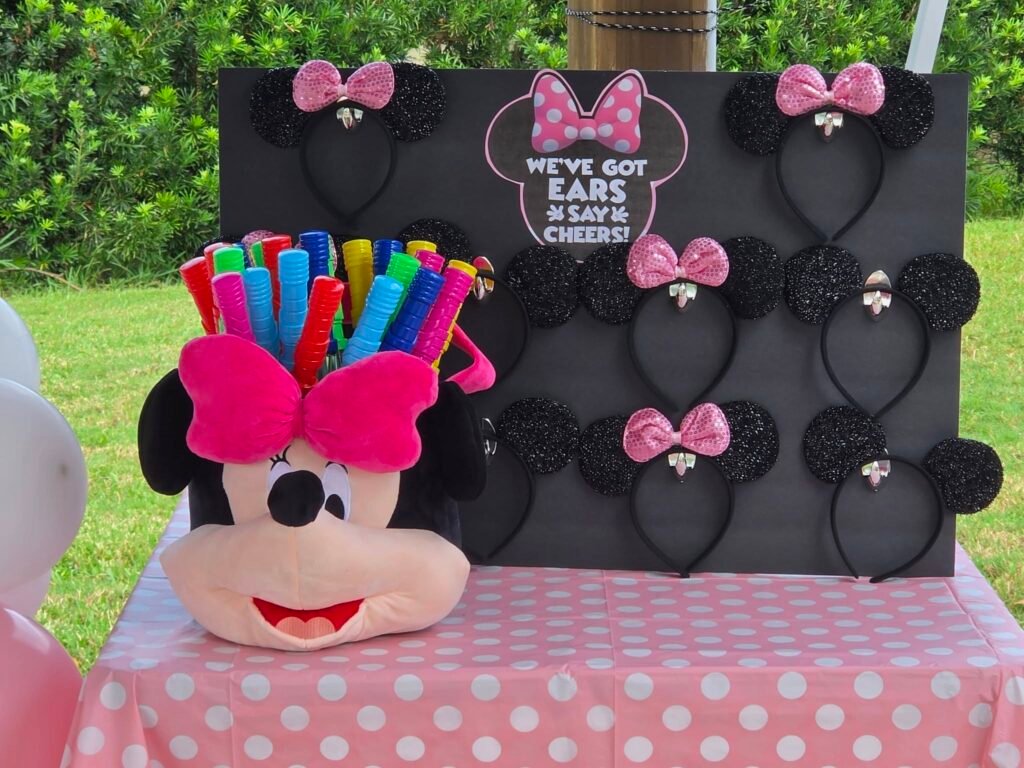 Decorate your own mouse ears board with markers and a big Minnie head