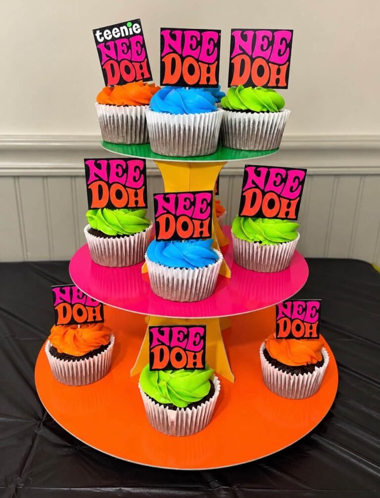 Orange and pink cupcake tower with Nee Doh cupcake toppers
