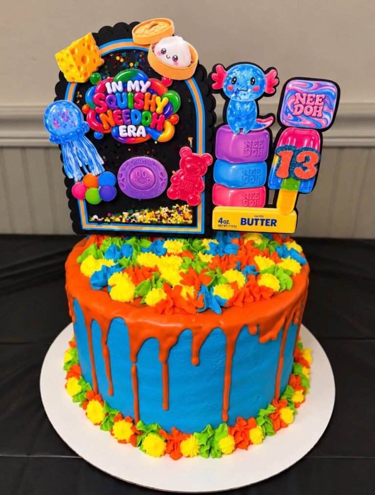 Neon drip birthday cake with rainbow buttercream and Nee Doh toppers