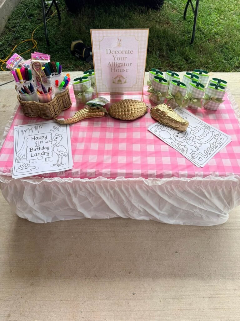 Pink gingham coloring station with markers and bayou coloring pages