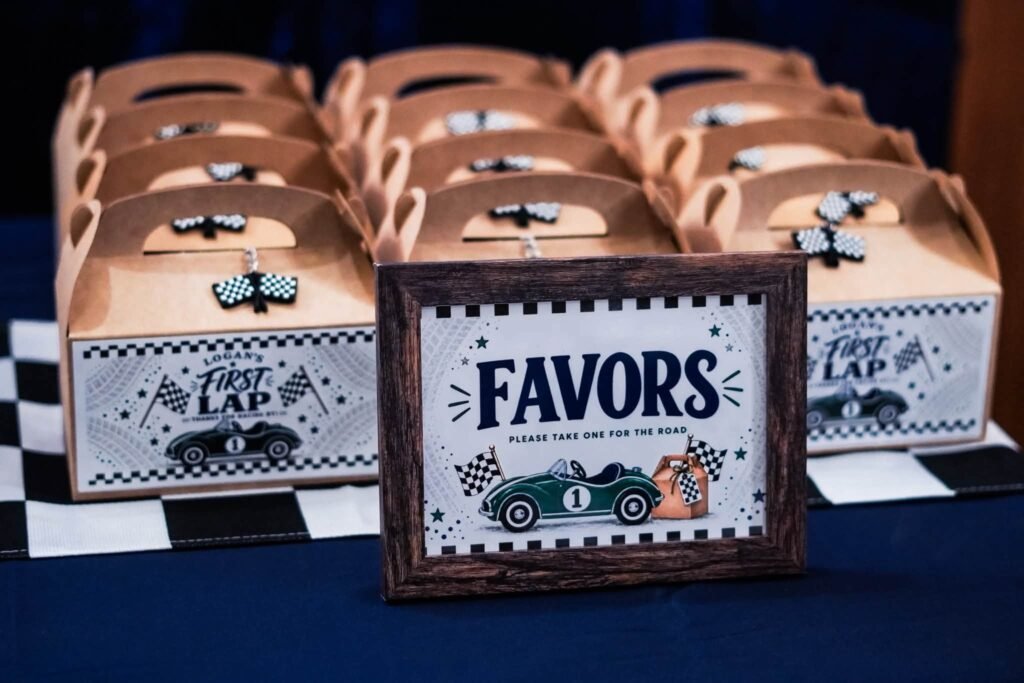 Race car favor boxes with a First Lap favors sign