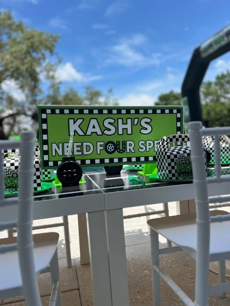 Need Four Speed race car sign in green and black by the pool