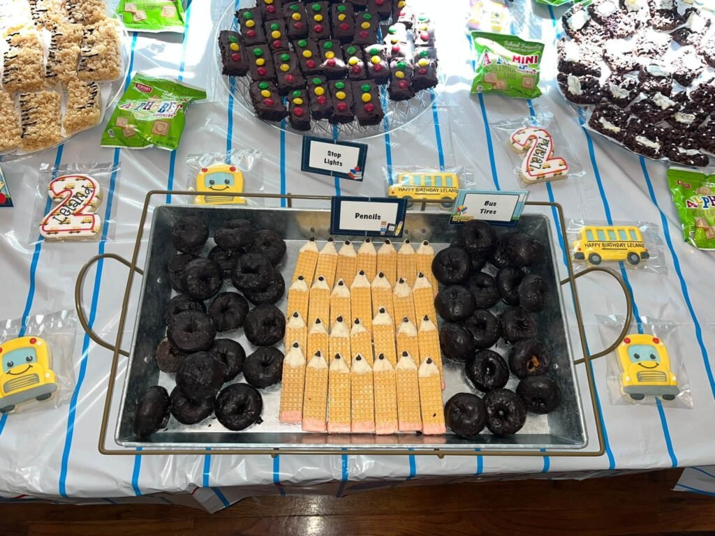 Snack table with brownies, cookies and rice krispie treats
