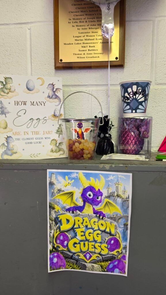 Dragon Egg Guess game sign with a jar on a party table