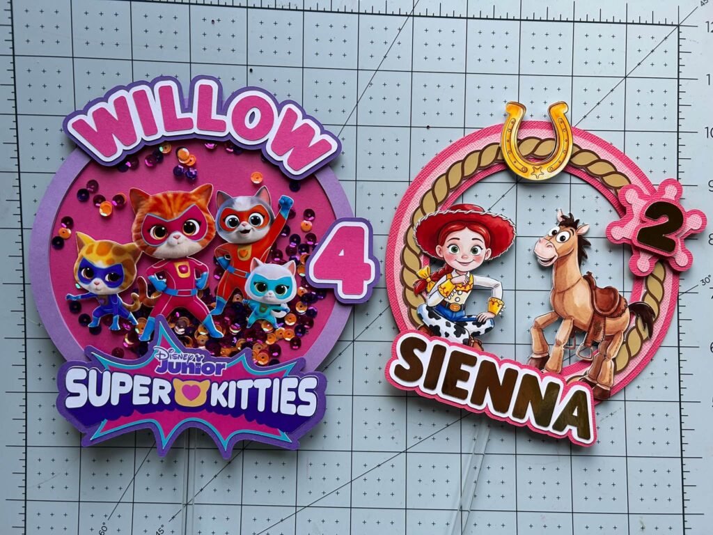 Layered Super Kitties and Toy Story cake toppers