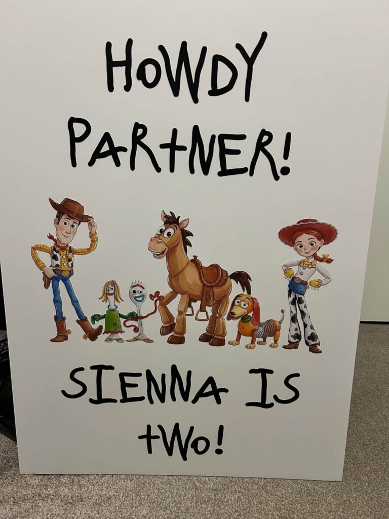 Howdy Partner Sienna Is Two sign with Toy Story characters