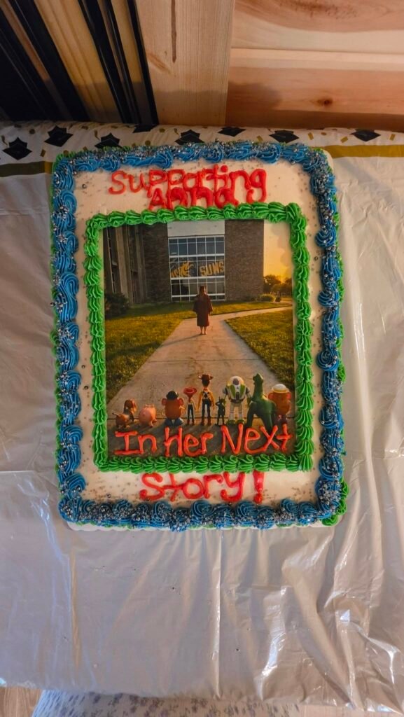 Toy Story graduation sheet cake about the grad starting her next story