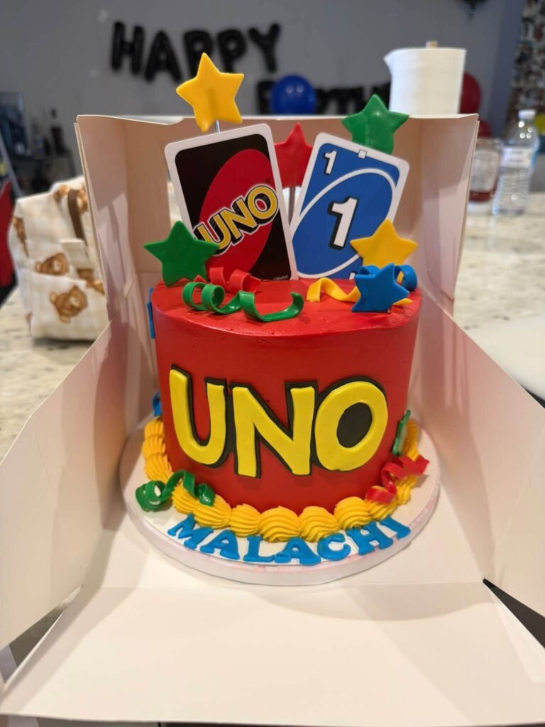 Two tier UNO birthday cake with card toppers