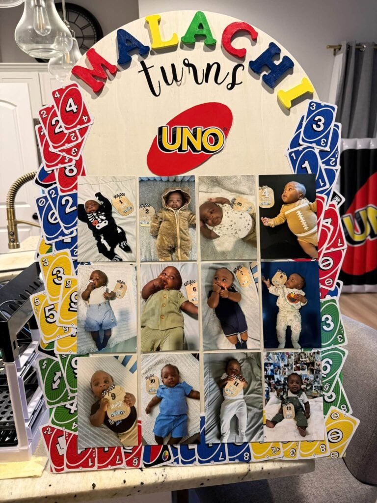 UNO photo board with baby photos from each month