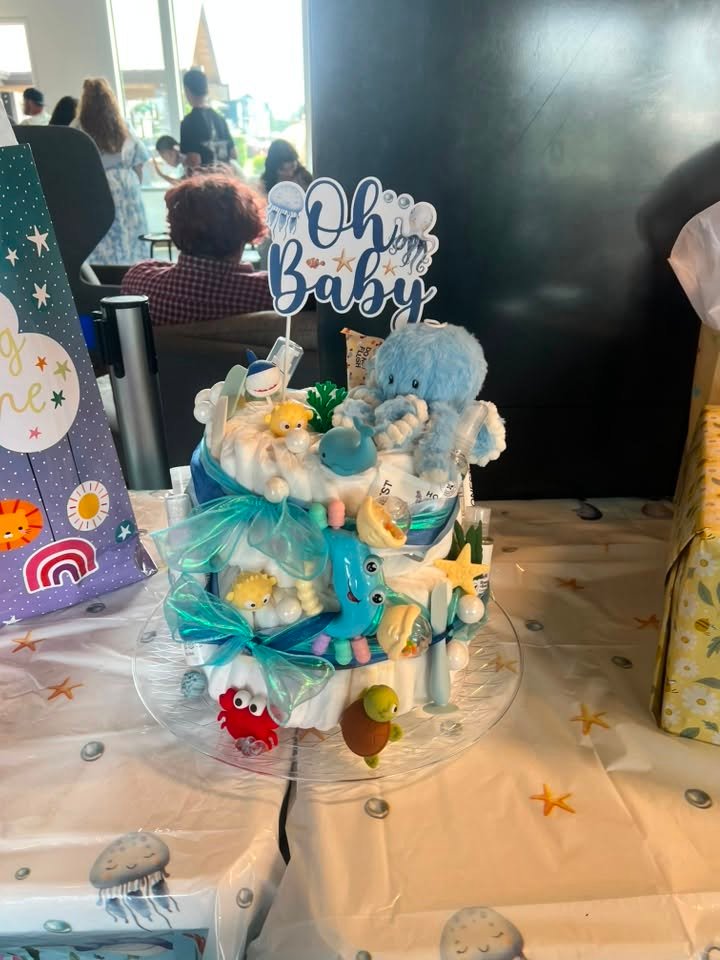 Diaper cake with sea animals and an Oh Baby topper