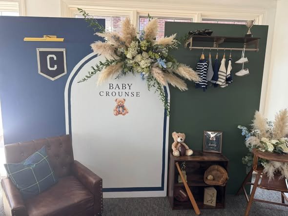 We Can Bearly Wait backdrop in navy and green with pampas grass and a teddy bear