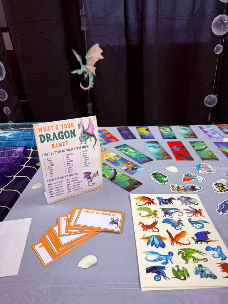 Whats Your Dragon Name sign with dragon cards