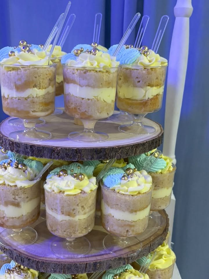 Three tier stand of trifle cups with honey cream